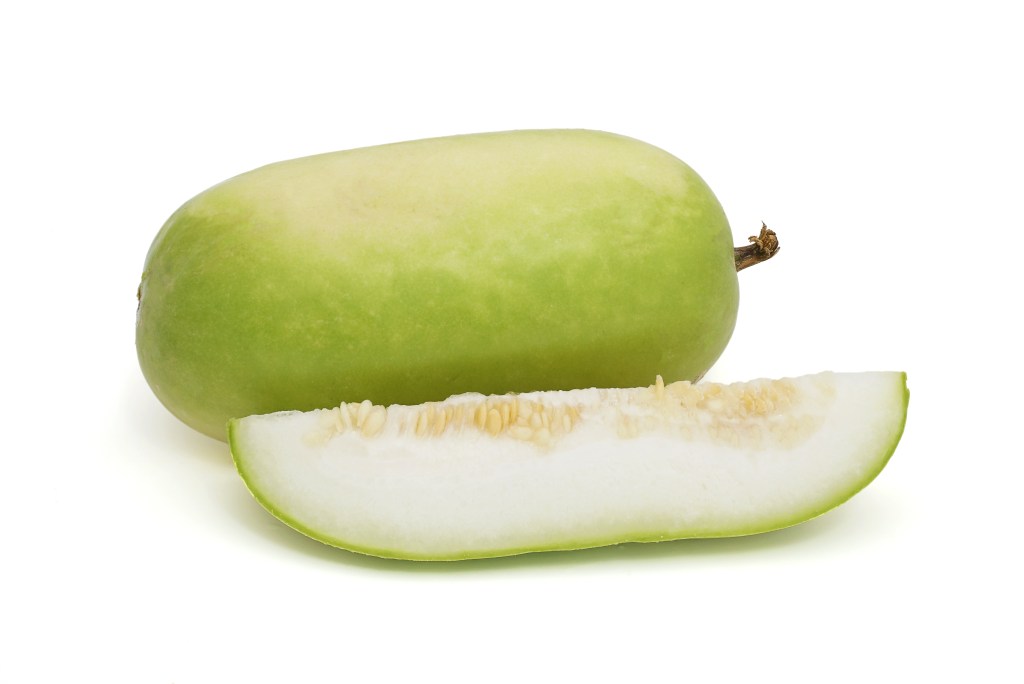Sliced Winter melon isolated on a white background. (White gourd, Winter gourd or Ash gourd)